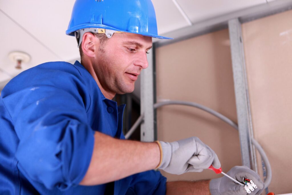 man fixing the wires