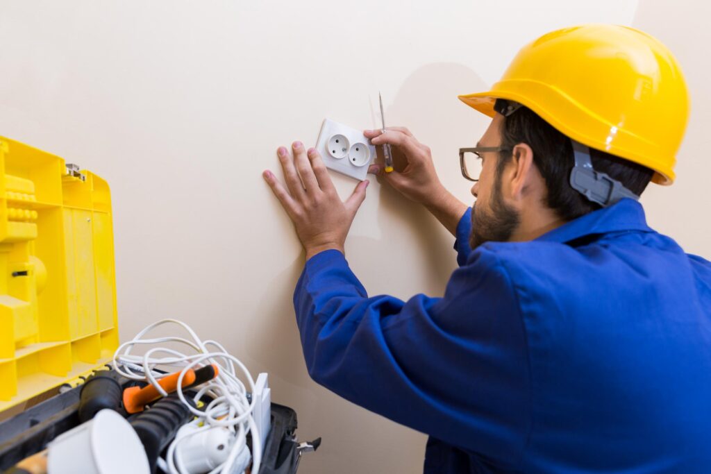 man attaching the plug