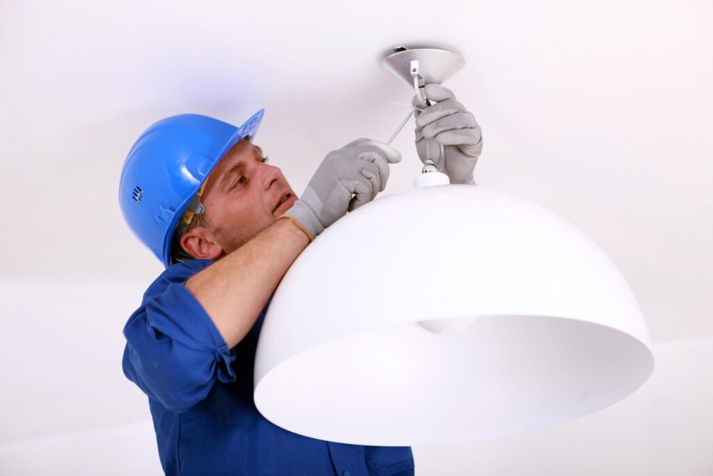 man fixing the light