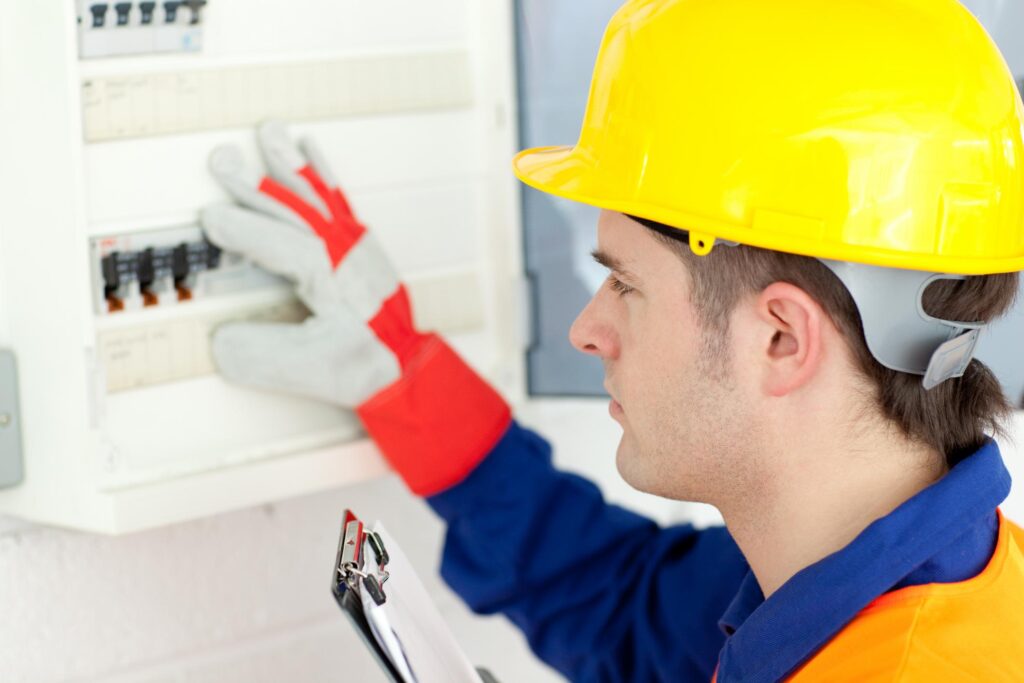 man checking the electric wires