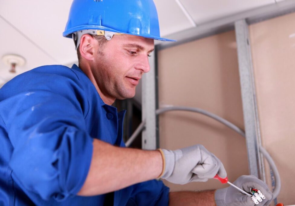 man fixing the wires